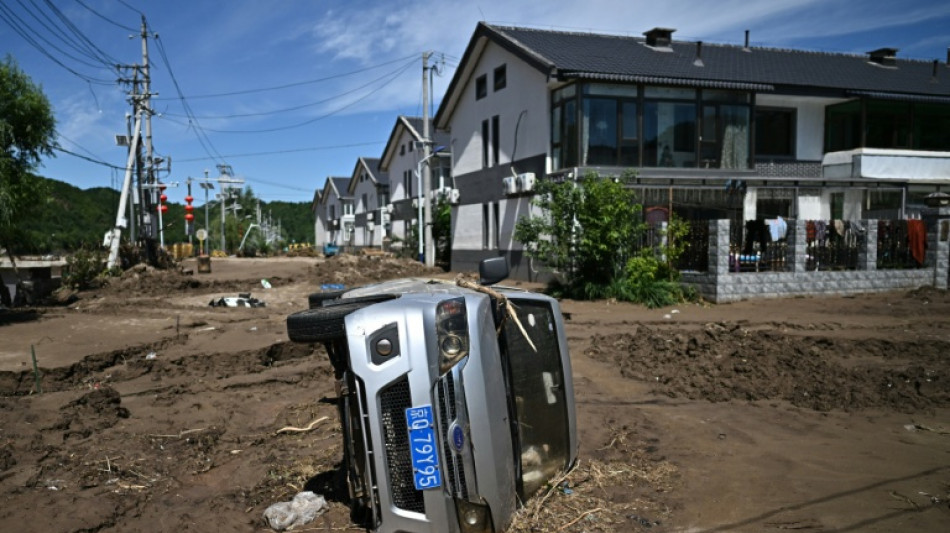 Pluies &agrave; P&eacute;kin: 44 morts, les autorit&eacute;s admettent des "failles"