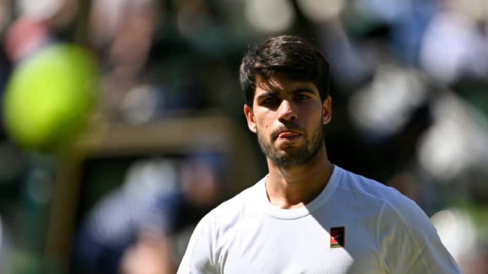 Smiling through: Alcaraz won't let Wimbledon defeat get him down