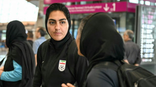 Iran releases assets of football captain in Australia asylum row