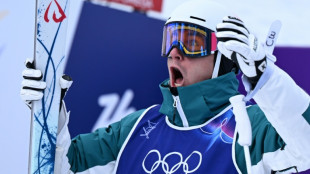 Cooper wins Olympic freestyle moguls gold after dramatic tie-break